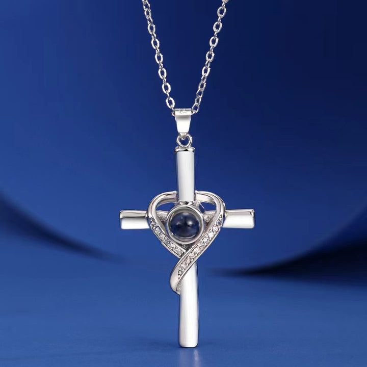 Gold cross heart projection necklace