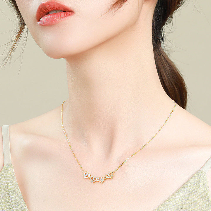 Gold magnetic four leaf clover heart necklace