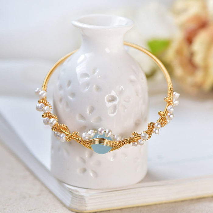 Pearl Cuff Bracelet with Braided Gold Wire and Blue Stone