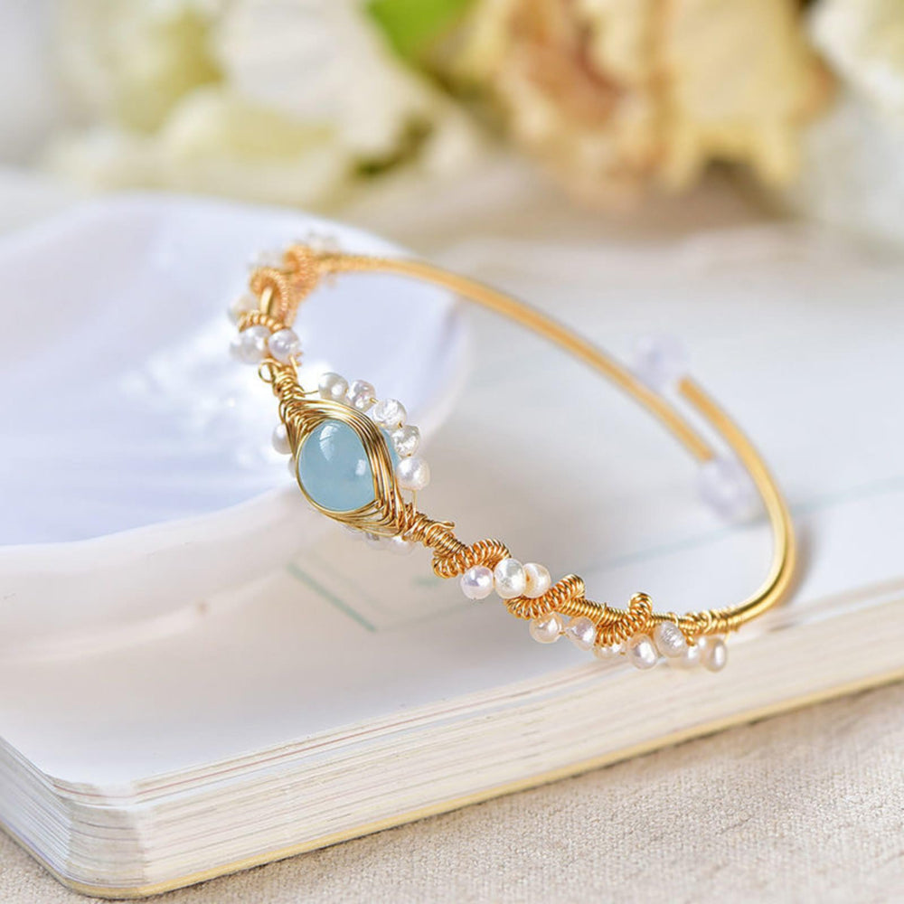 Gold braided wire cuff bracelet with pearls